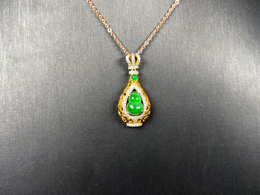 A rich green fortune gourd jadeite pendant.