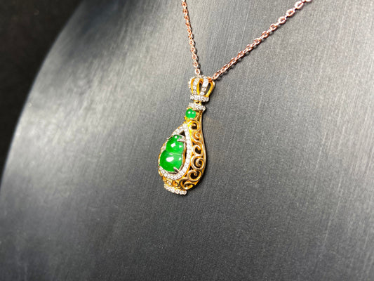 A rich green fortune gourd jadeite pendant.