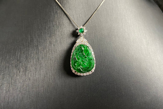 A green jade phoenix, symbolizing good fortune and prosperity, elegantly set in 925 silver.
