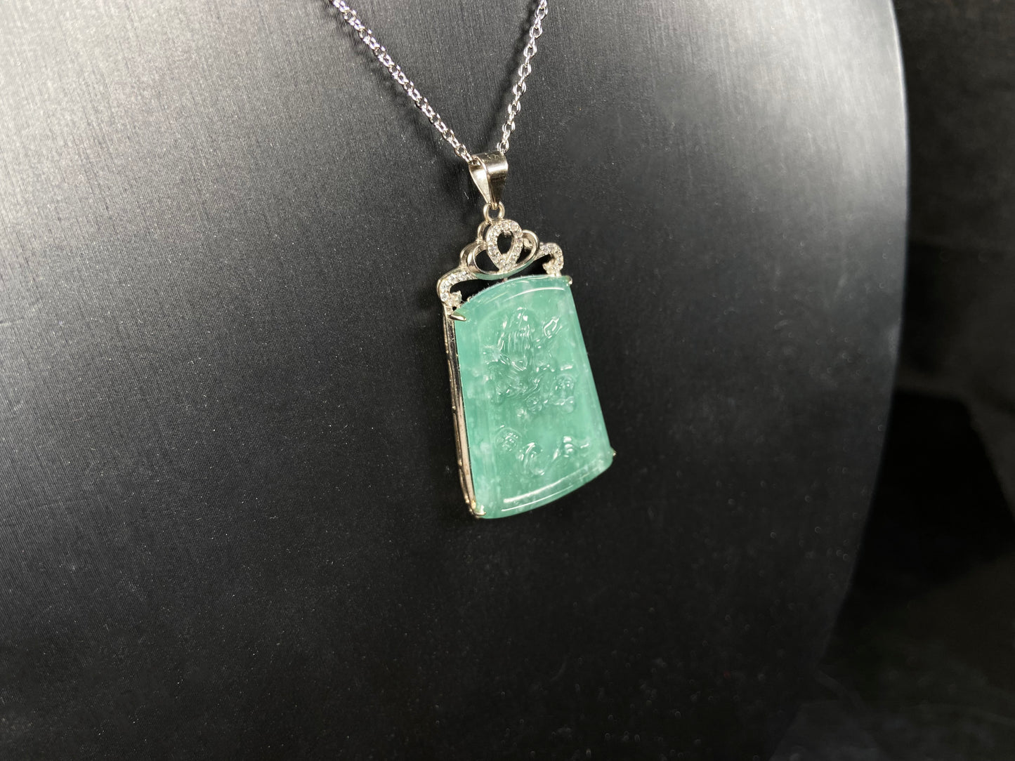A icy green dragon sparkle jadeite pendant.