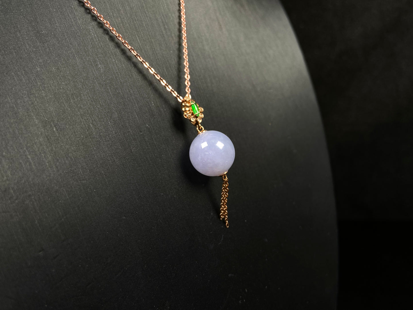 A lavender moon orb jadeite pendant.