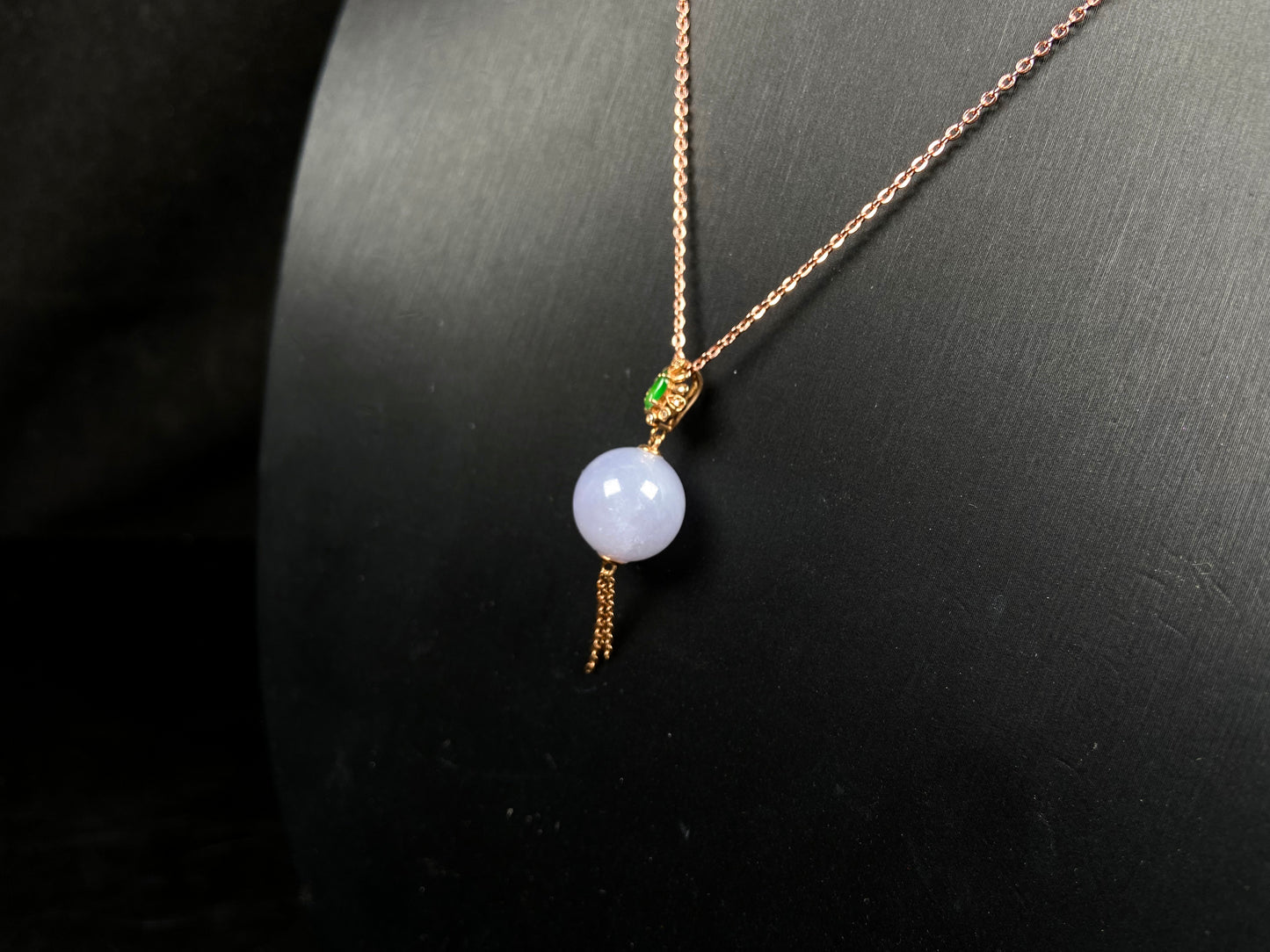 A lavender moon orb jadeite pendant.