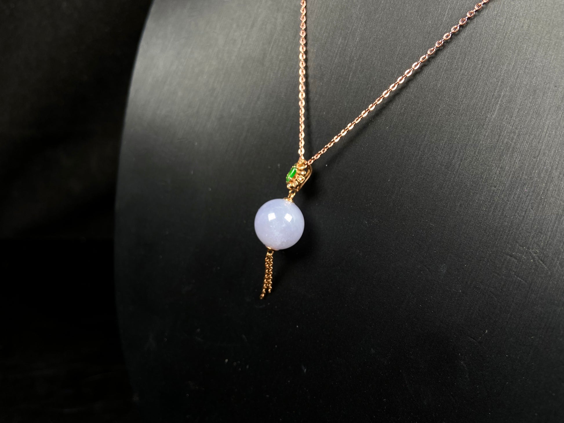 A lavender moon orb jadeite pendant.