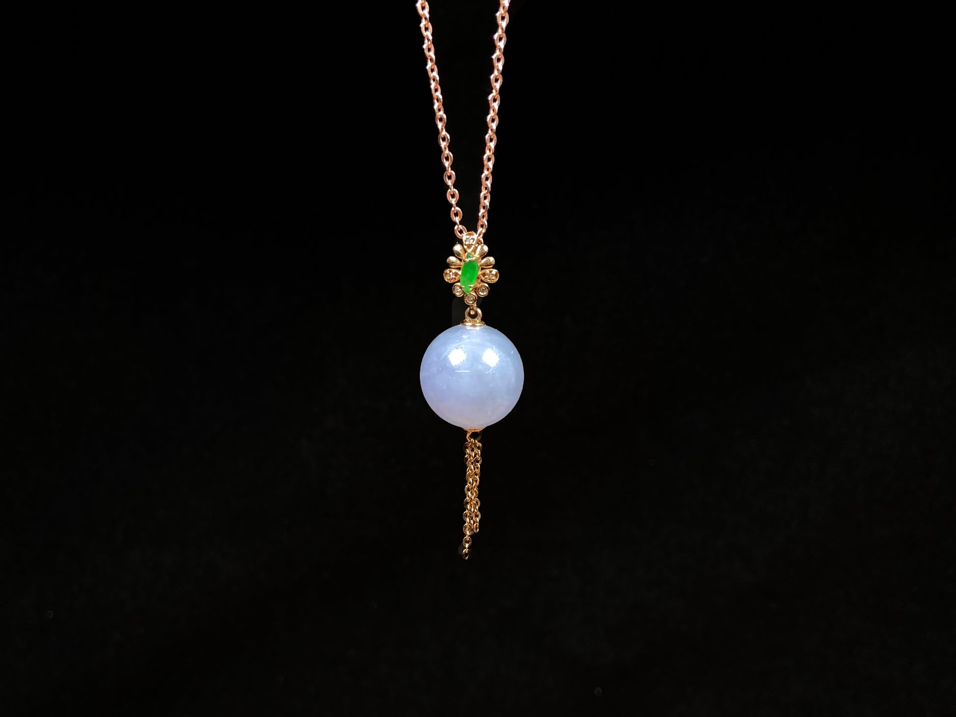 A lavender moon orb jadeite pendant.