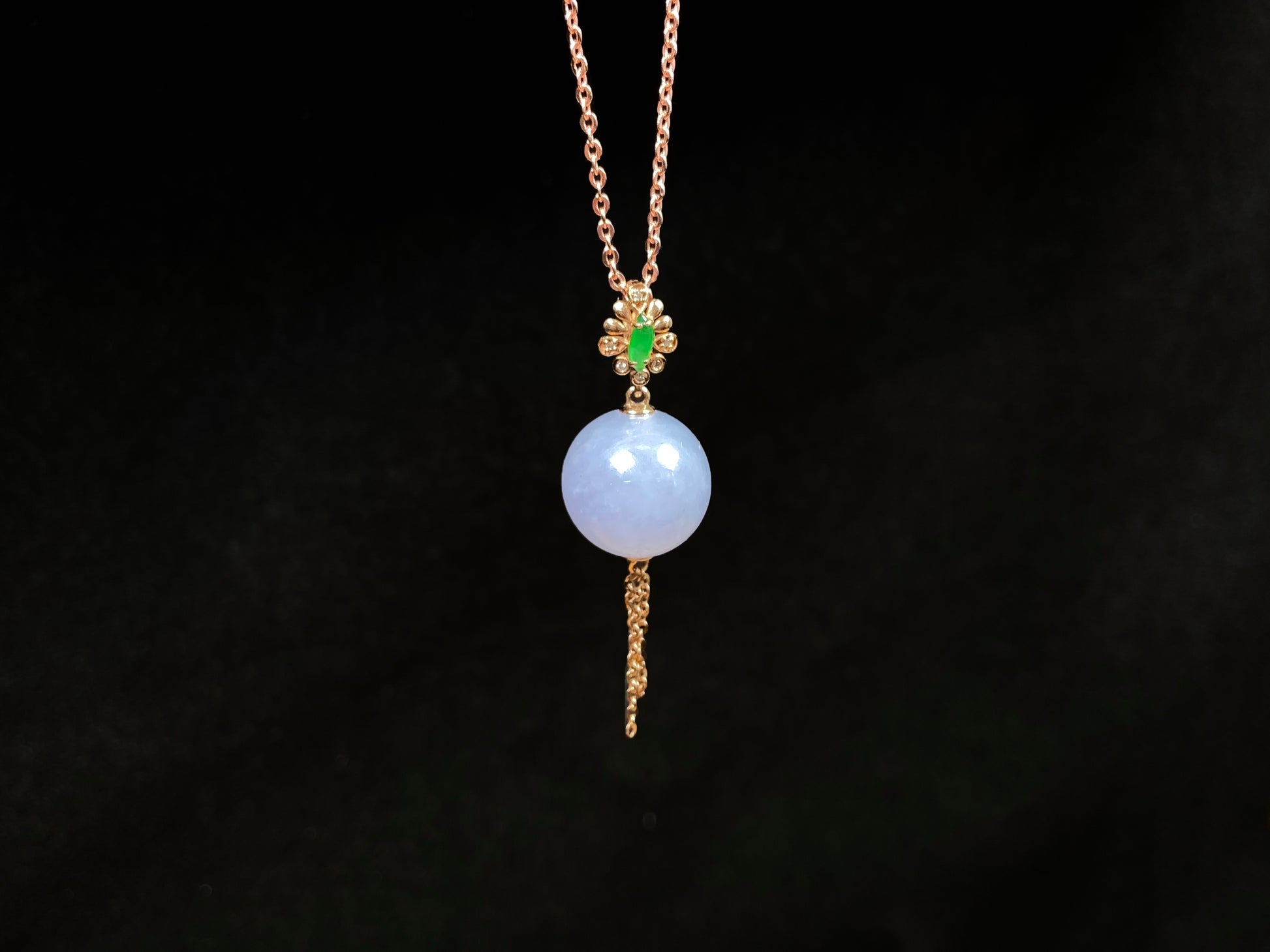 A lavender moon orb jadeite pendant.