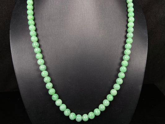 A crisp apple green beads necklace.