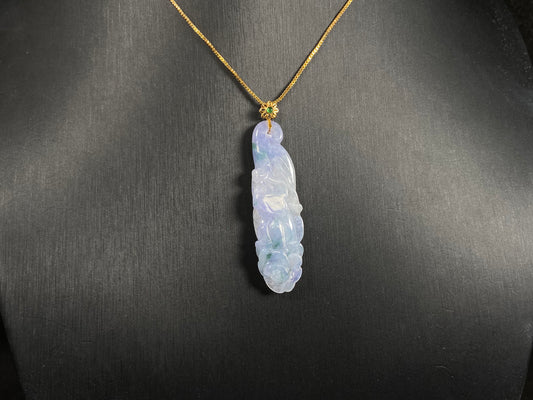 This pendant features a white and purple jadeite flower with hints of green.