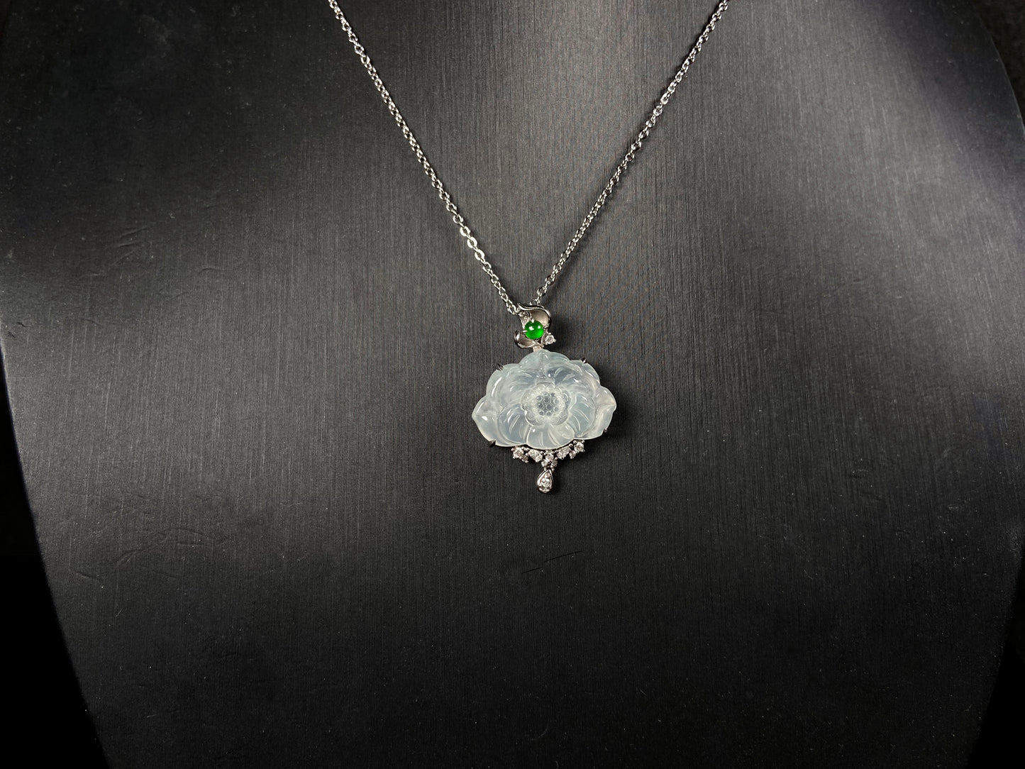 A icy peony with green glow jadeite pendant.