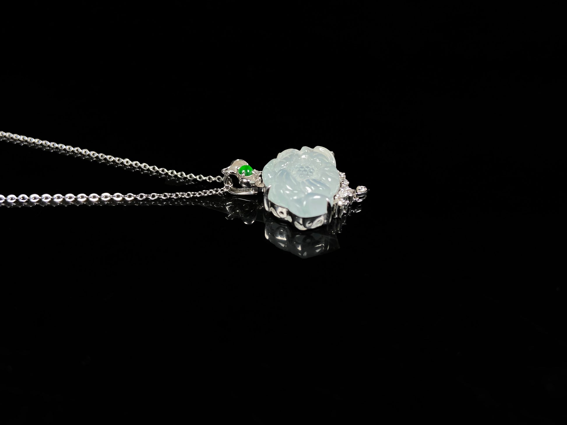 A icy peony with green glow jadeite pendant.