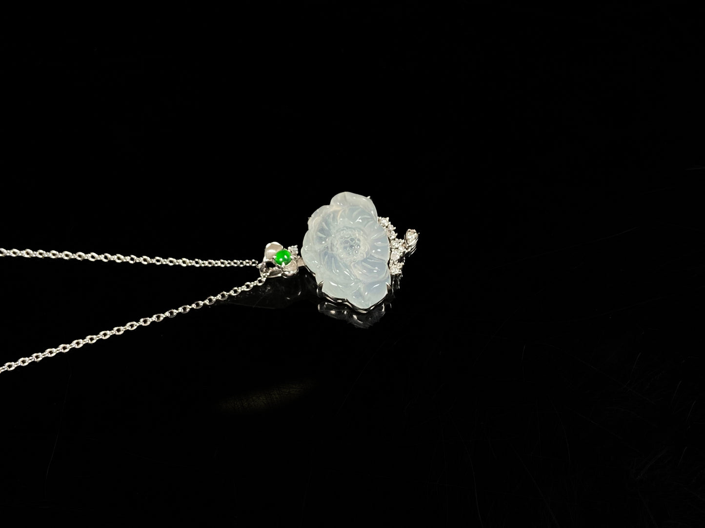 A icy peony with green glow jadeite pendant.