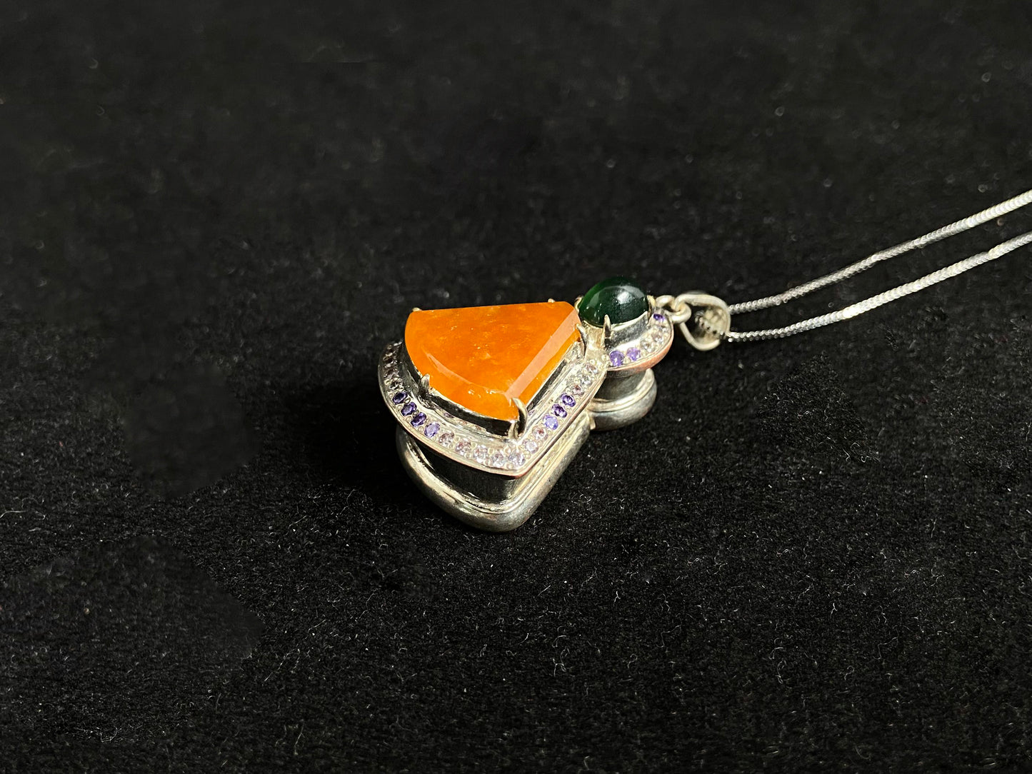 This unique pendant features an orange yellow "Wu Shi" plaque accented with a deep green jade bead, creating a striking color contrast.