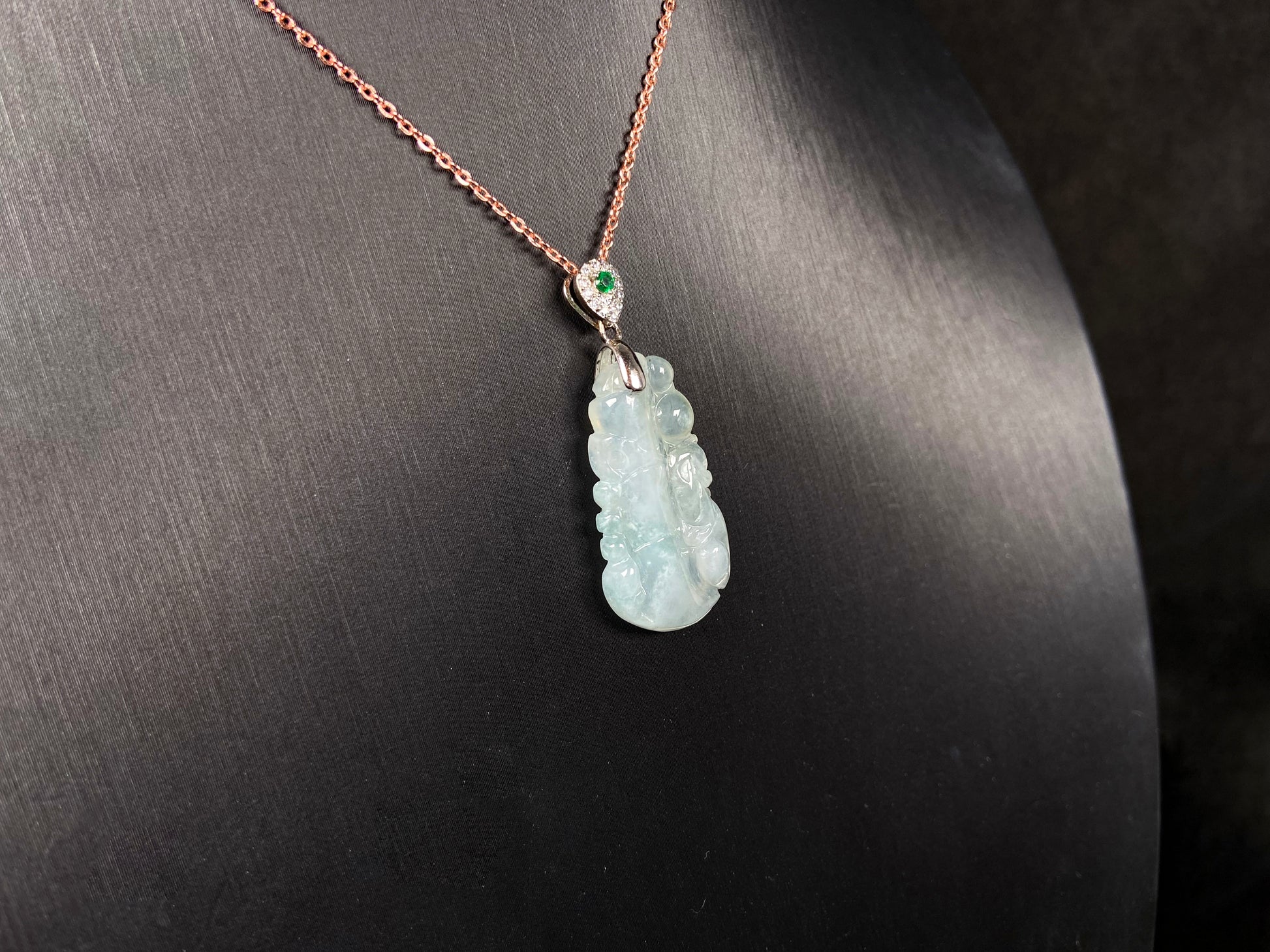 A icy green tone bamboo jadeite pendant.
