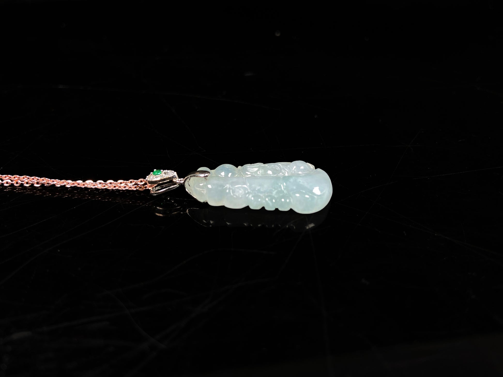 A icy green tone bamboo jadeite pendant.