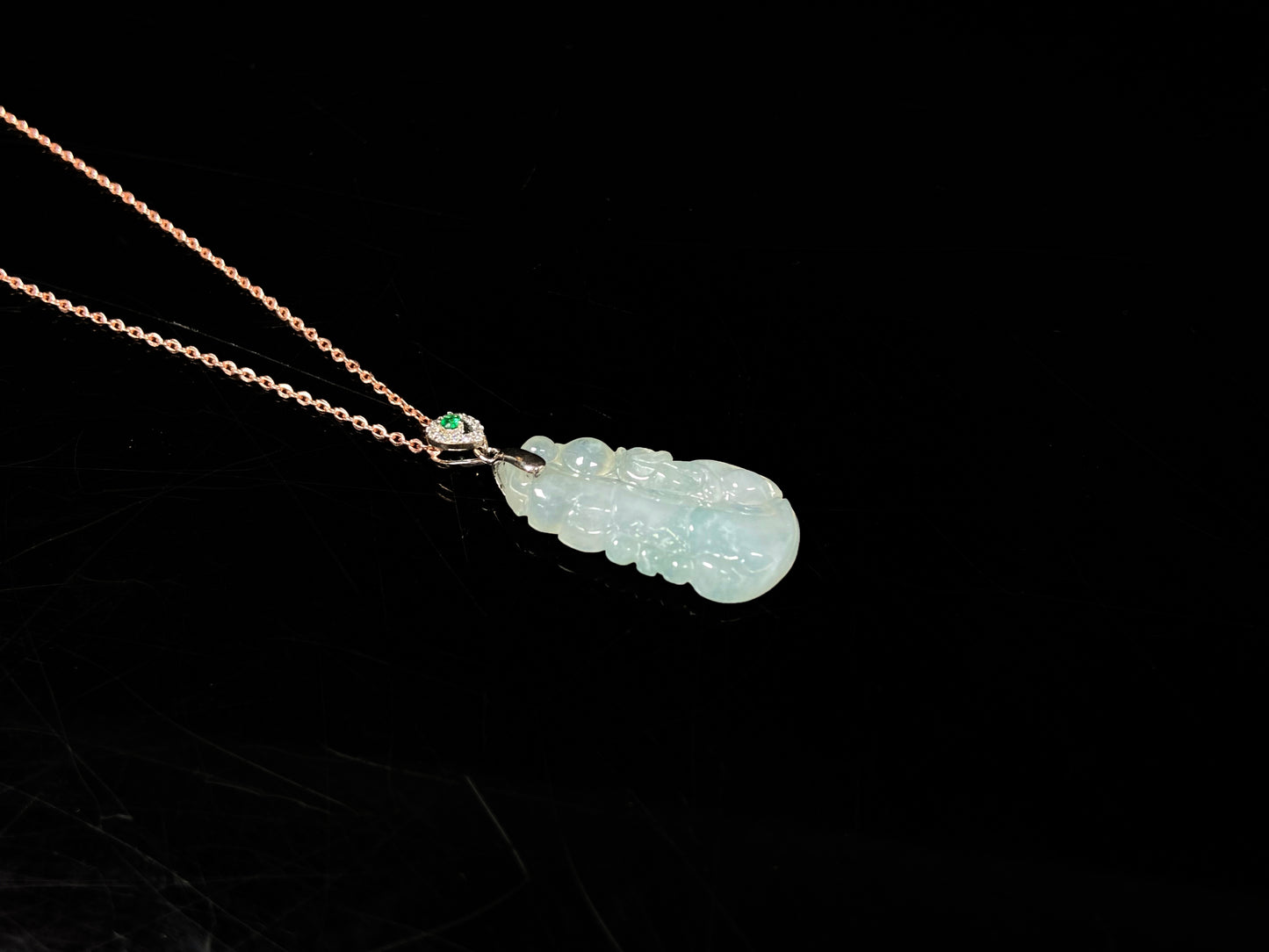 A icy green tone bamboo jadeite pendant.