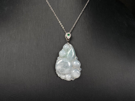A auspicious dew fortune jadeite pendant.
