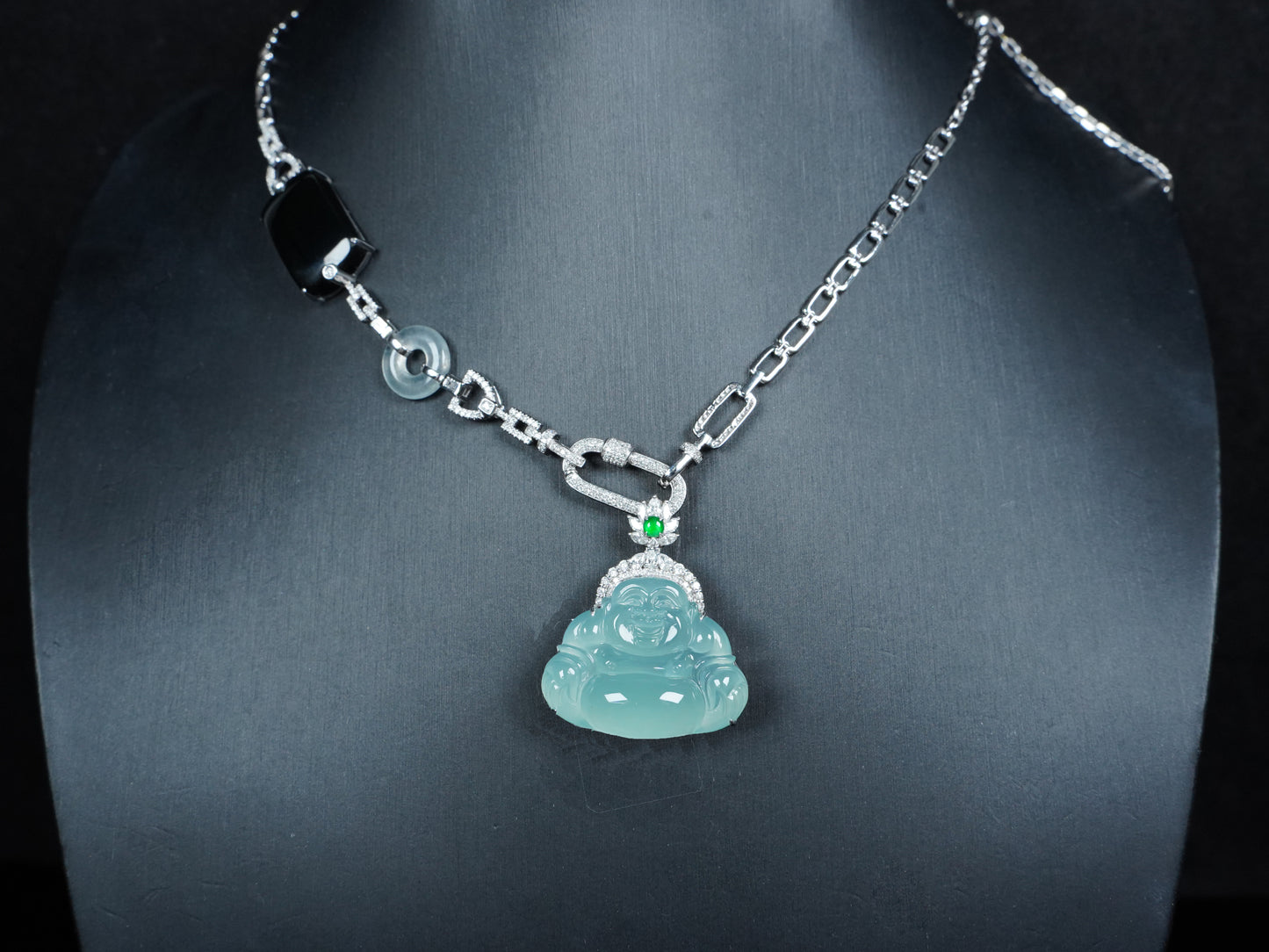 A icy blue laughing buddha jadeite pendant.
