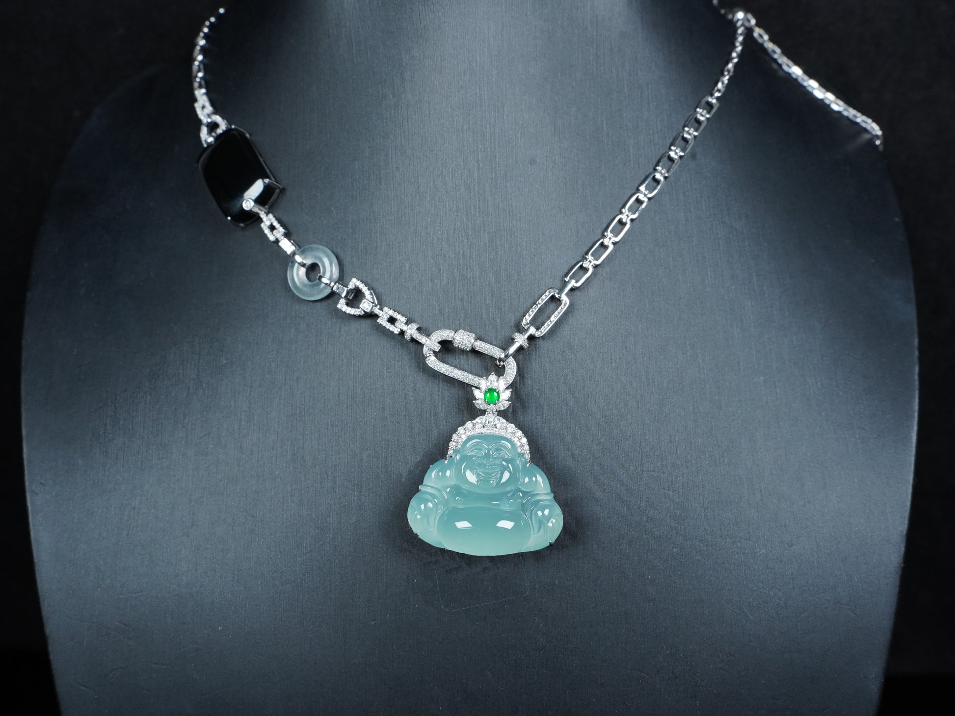 A icy blue laughing buddha jadeite pendant.