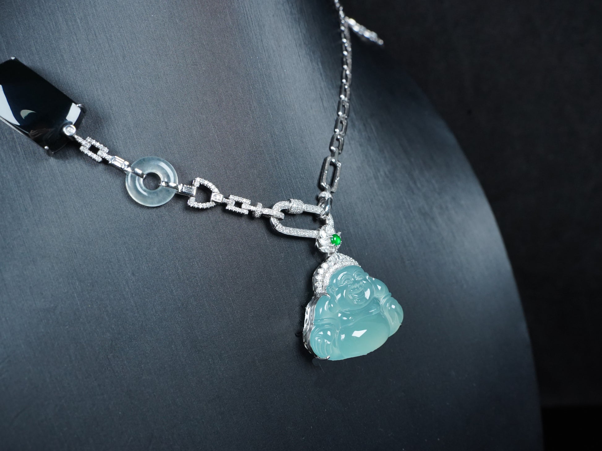 A icy blue laughing buddha jadeite pendant.