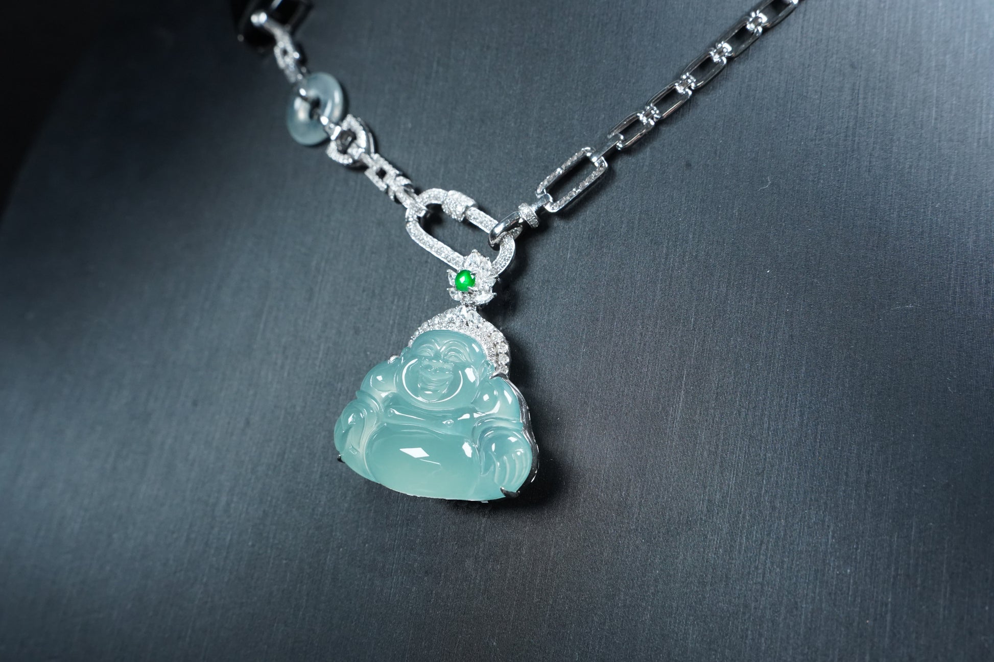A icy blue laughing buddha jadeite pendant.