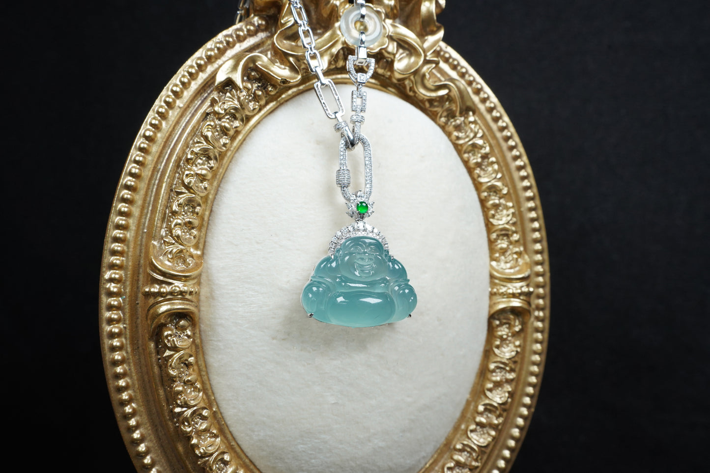 A icy blue laughing buddha jadeite pendant.