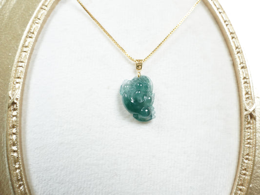 A lucky three legged toad jadeite pendant.
