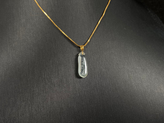 An ice jadeite pendant carved as a blessing melon.