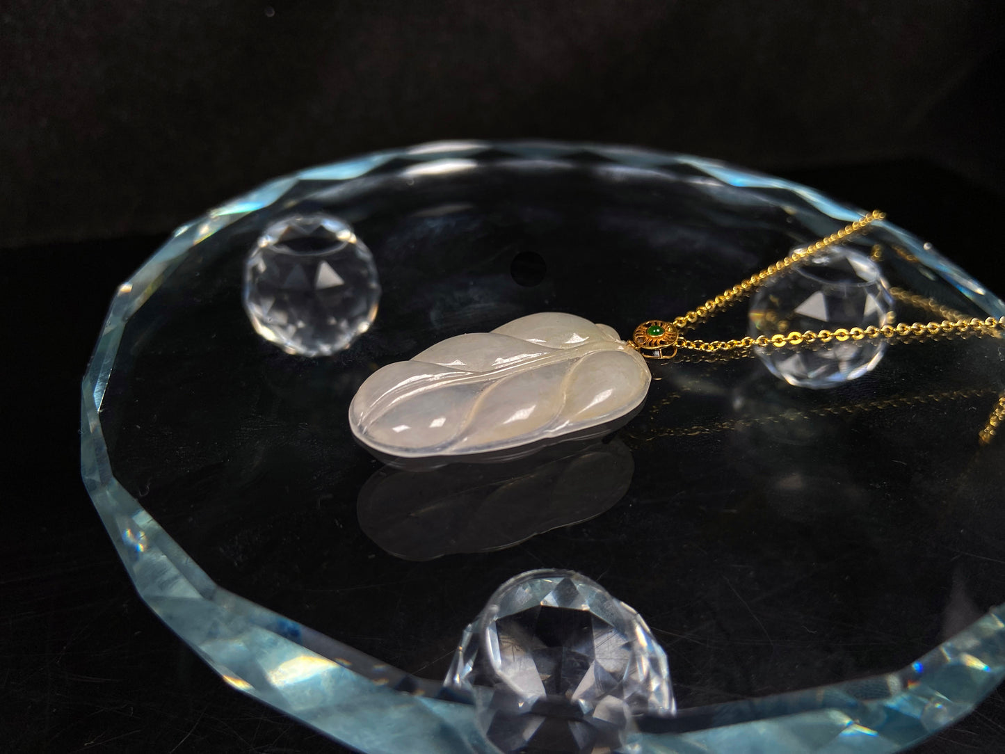 A leaf warm yellowish white jadeite pendant.