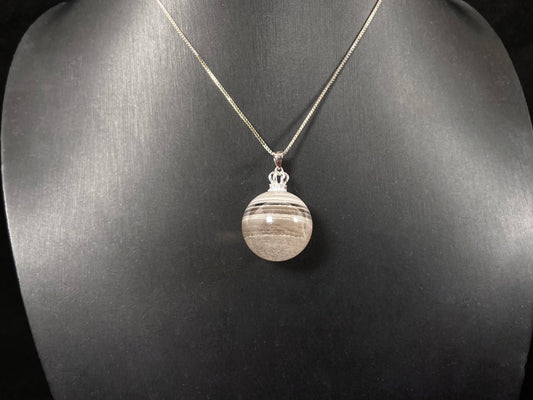 Layered White Phantom Quartz pendant.