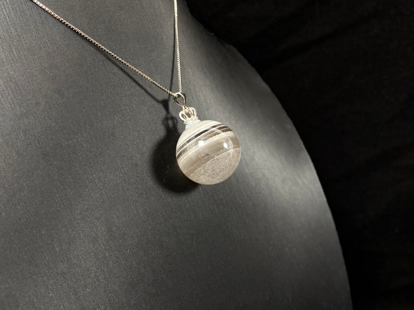 Layered White Phantom Quartz pendant.