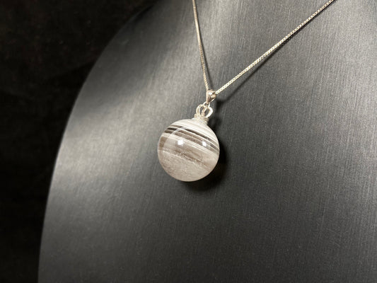 Layered White Phantom Quartz pendant.