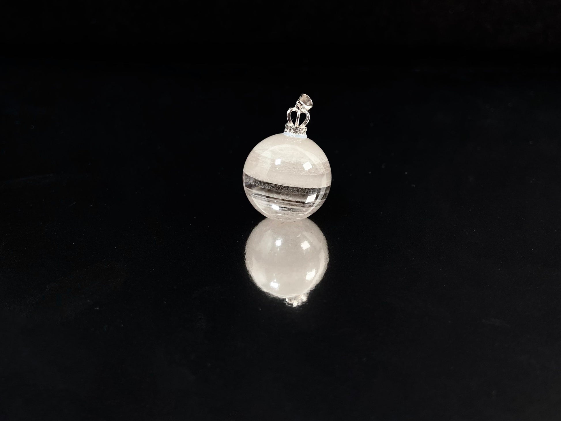 Layered White Phantom Quartz pendant.