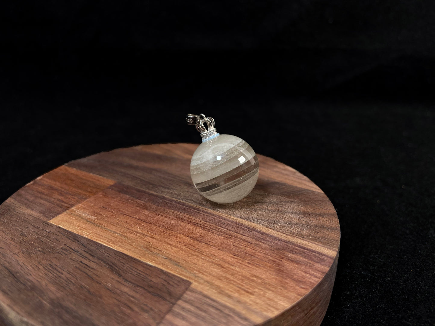 Layered White Phantom Quartz pendant.