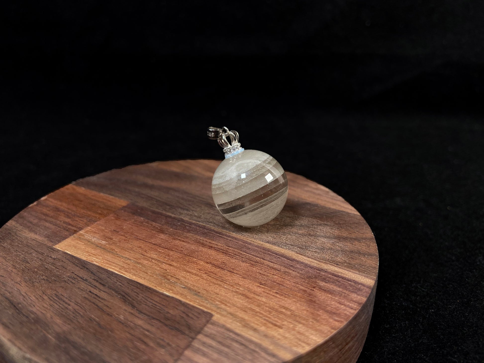 Layered White Phantom Quartz pendant.