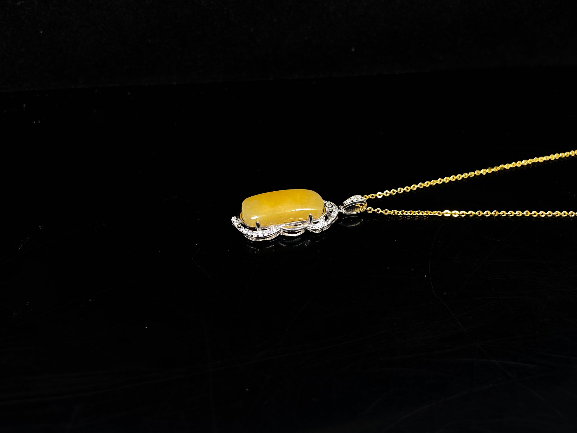 A gentle wheat yellow jadeite pendant.