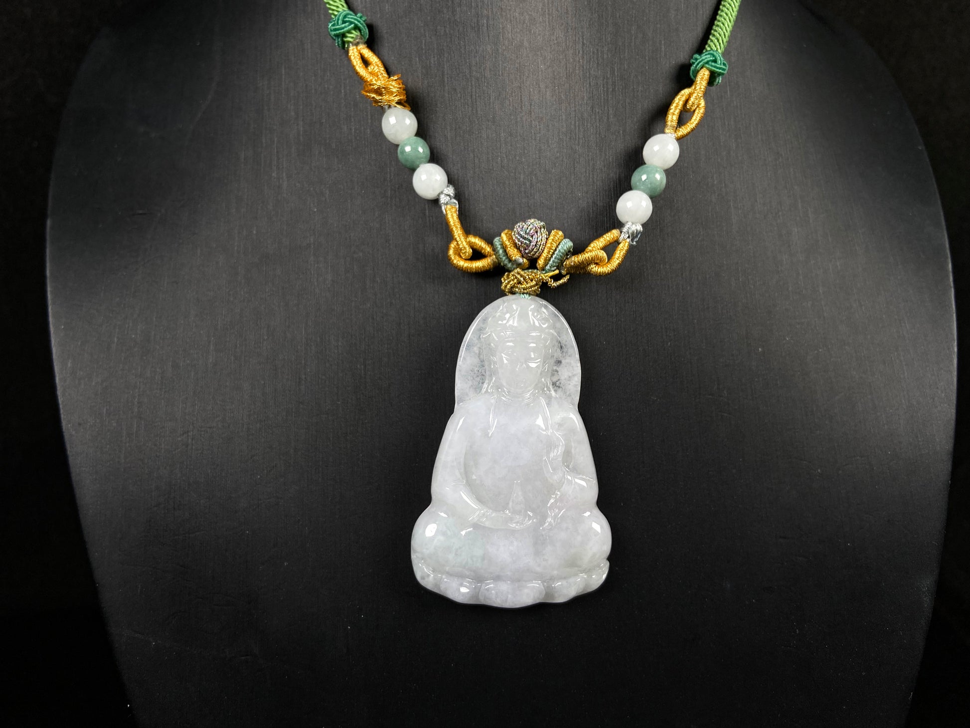 A serene white guanyin jadeite pendant.
