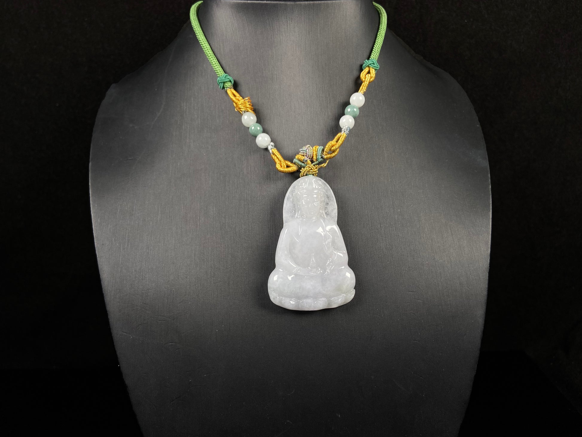 A serene white guanyin jadeite pendant.