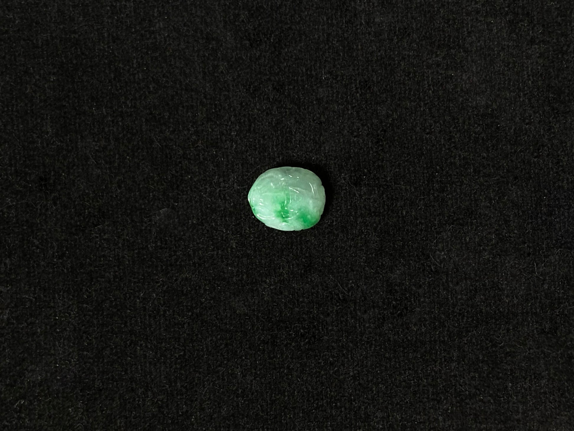 A lush floating green pixiu loose jadeite.