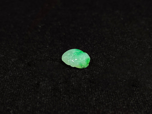 A lush floating green pixiu loose jadeite.