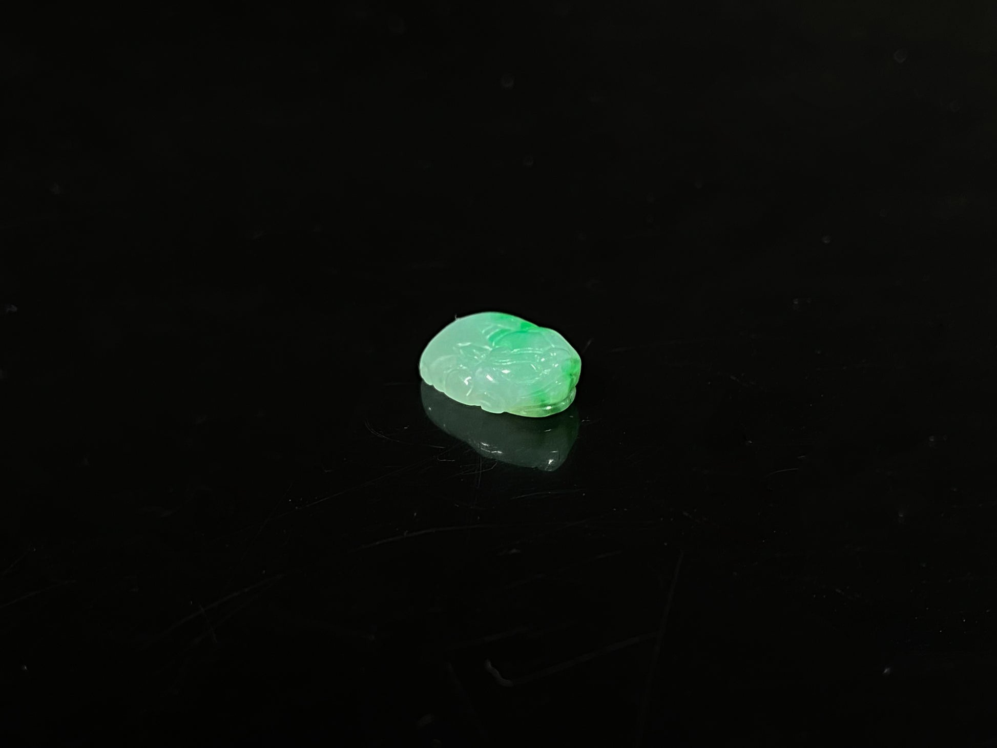 A lush floating green pixiu loose jadeite.
