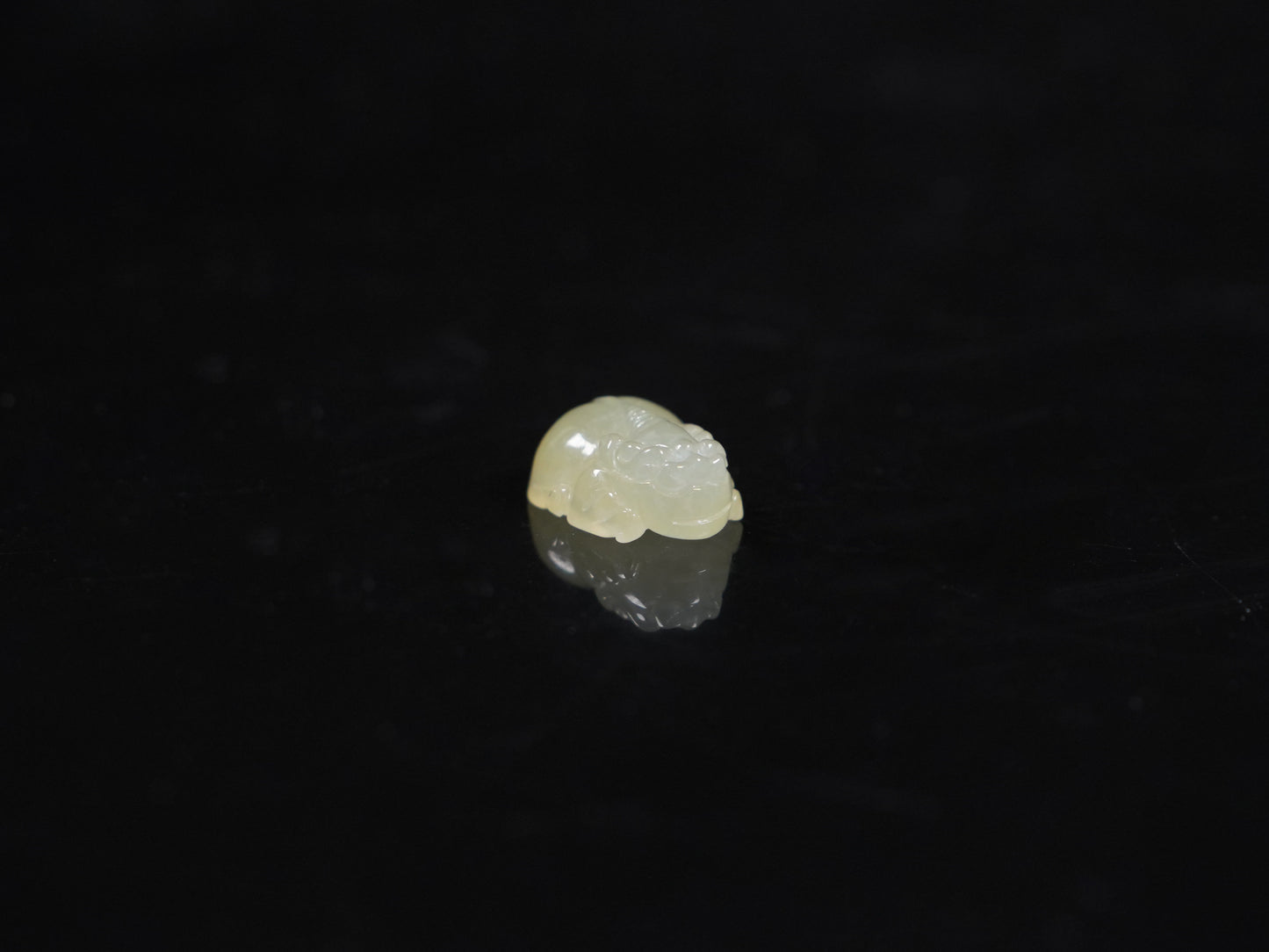 A warm yellow Pixiu loose jadeite.