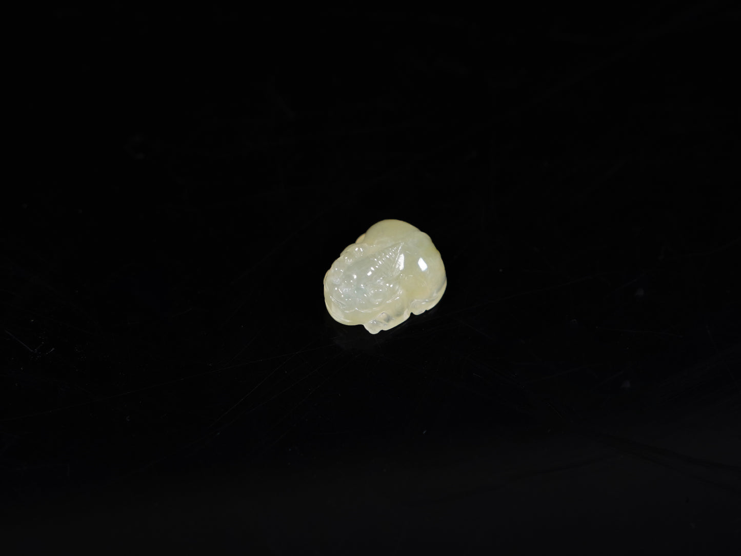 A warm yellow Pixiu loose jadeite.