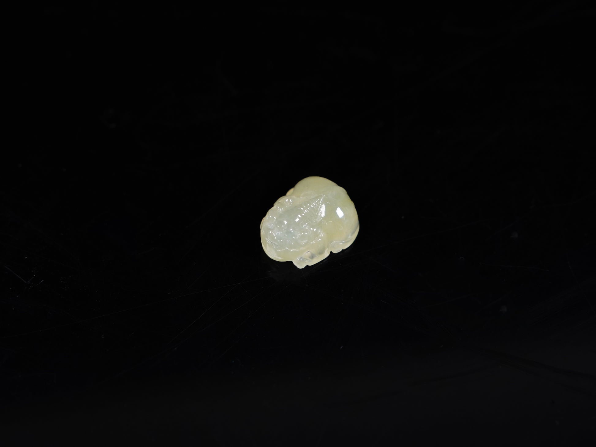 A warm yellow Pixiu loose jadeite.