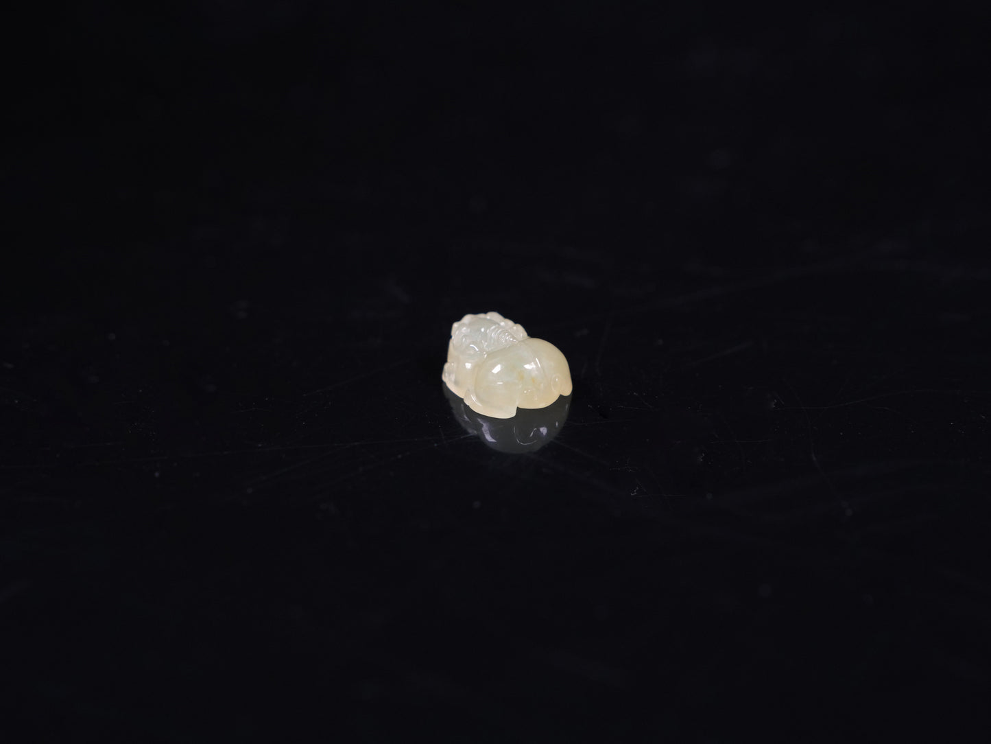 A warm yellow Pixiu loose jadeite.