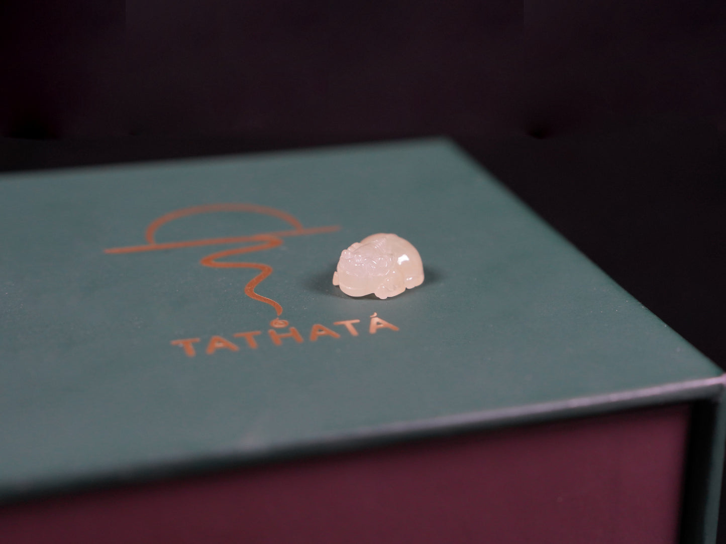 A warm yellow Pixiu loose jadeite.