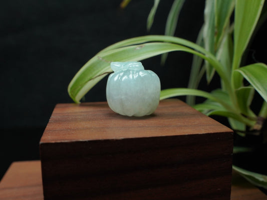 A mint green pumpkin loose jadeite.