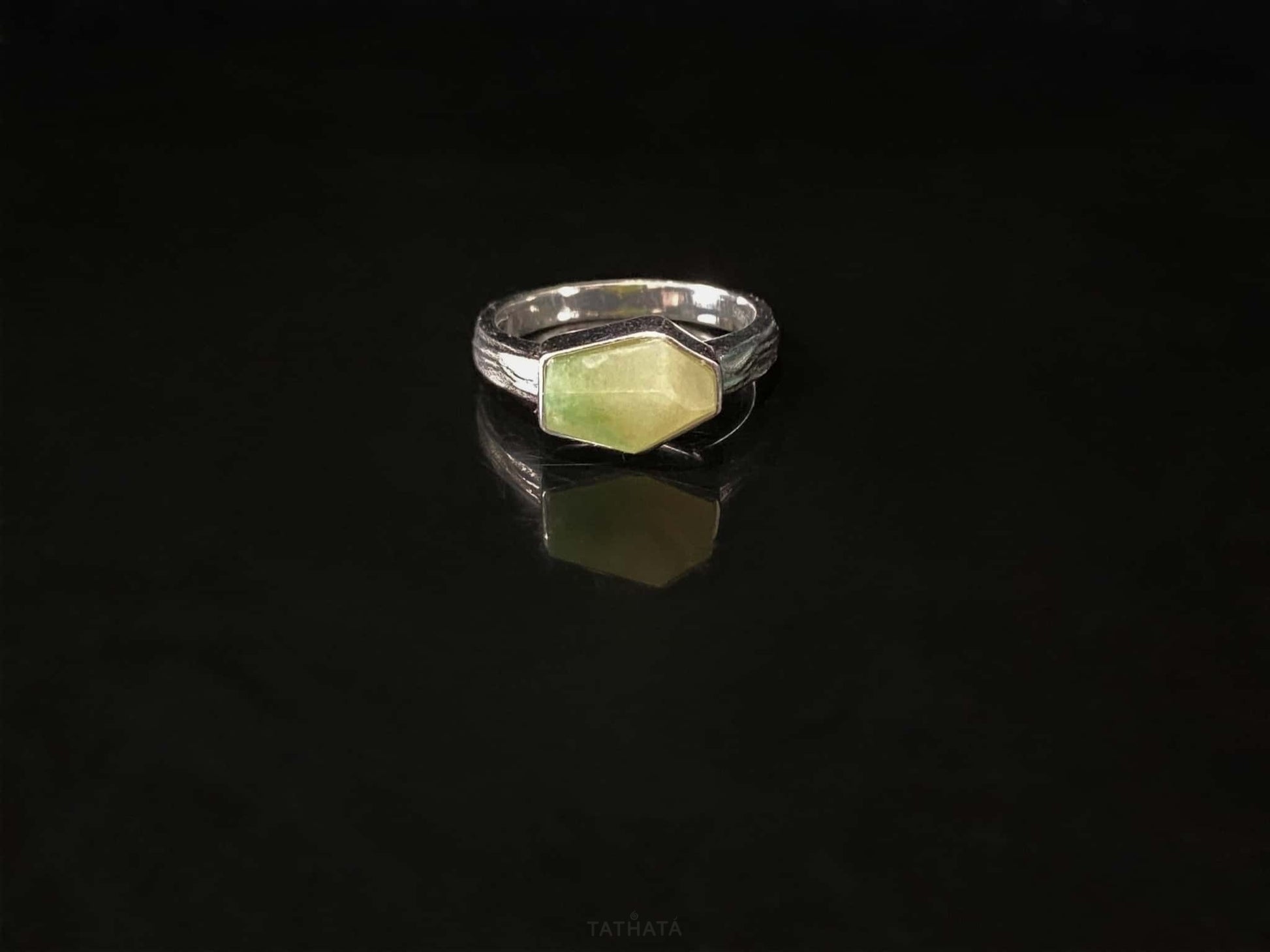 A honey lime gradient jadeite ring.