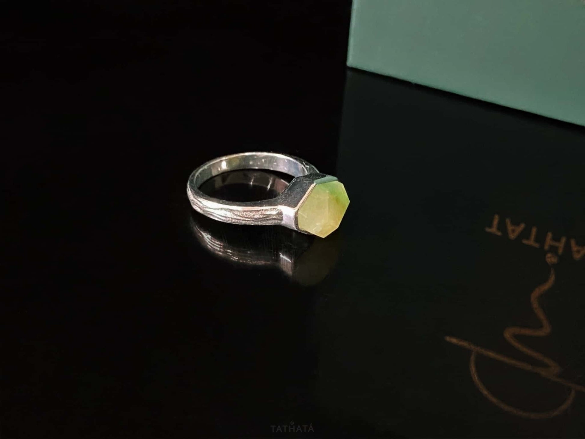 A honey lime gradient jadeite ring.