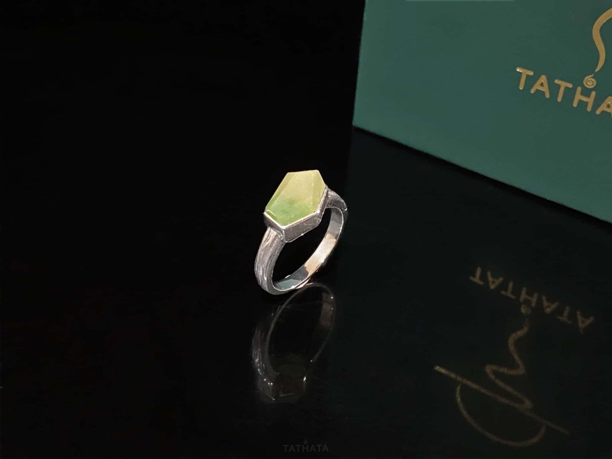 A honey lime gradient jadeite ring.