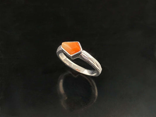 A sunset orange gradient jadeite ring.