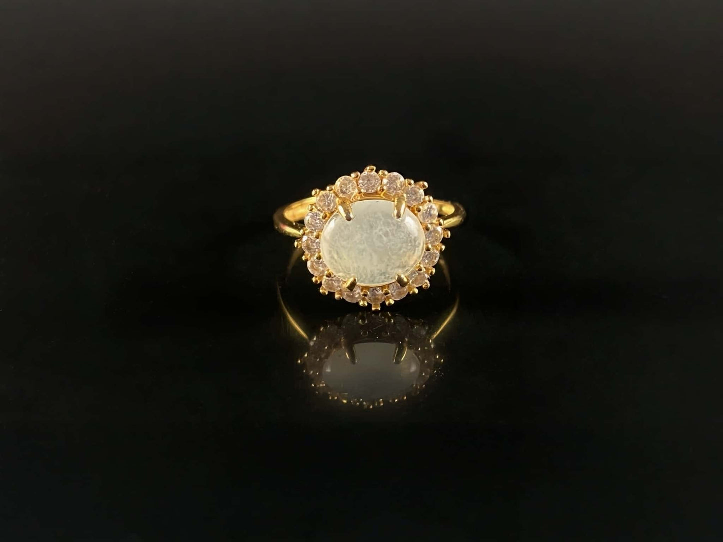 A ice white sparkle jadeite ring.